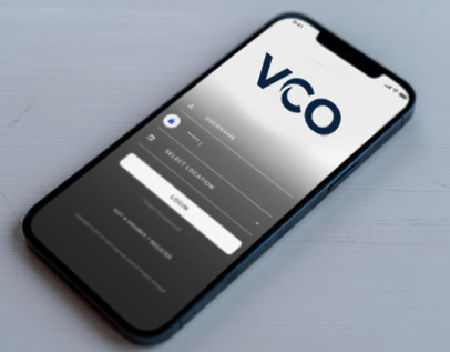 Smartphone displaying a login screen for an app with a logo reading "VCO" at the top.